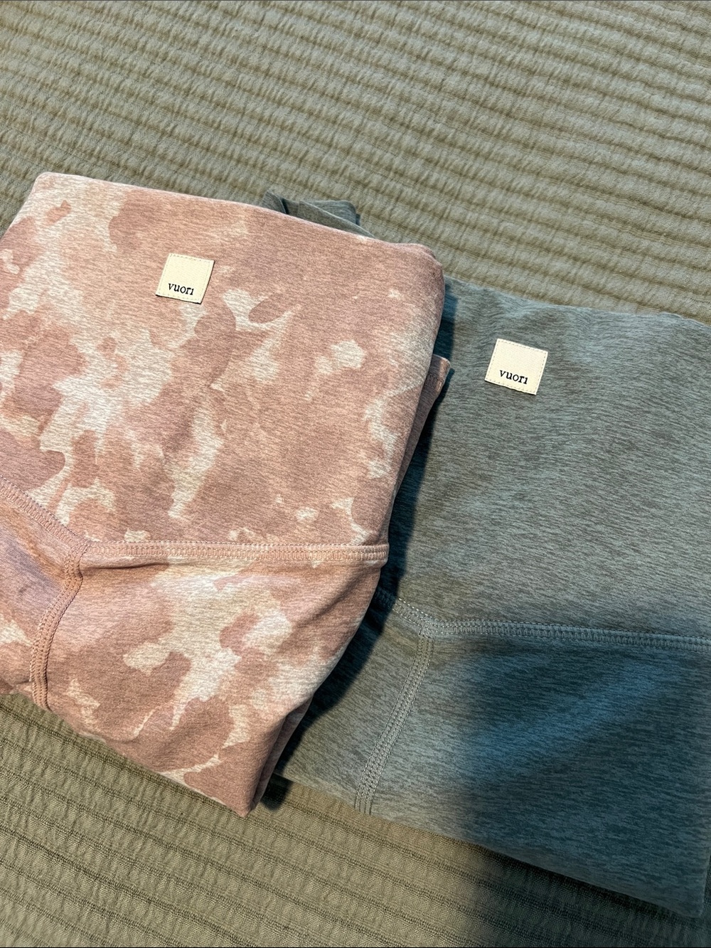 BUNDLE Vuori Biker Shorts Pink Camo-like pattern and heathered green/teal